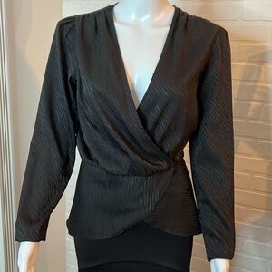 Aqua long sleeve peplum top Size M